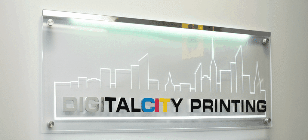 Digital City Printing office sign with NYC skyline logo