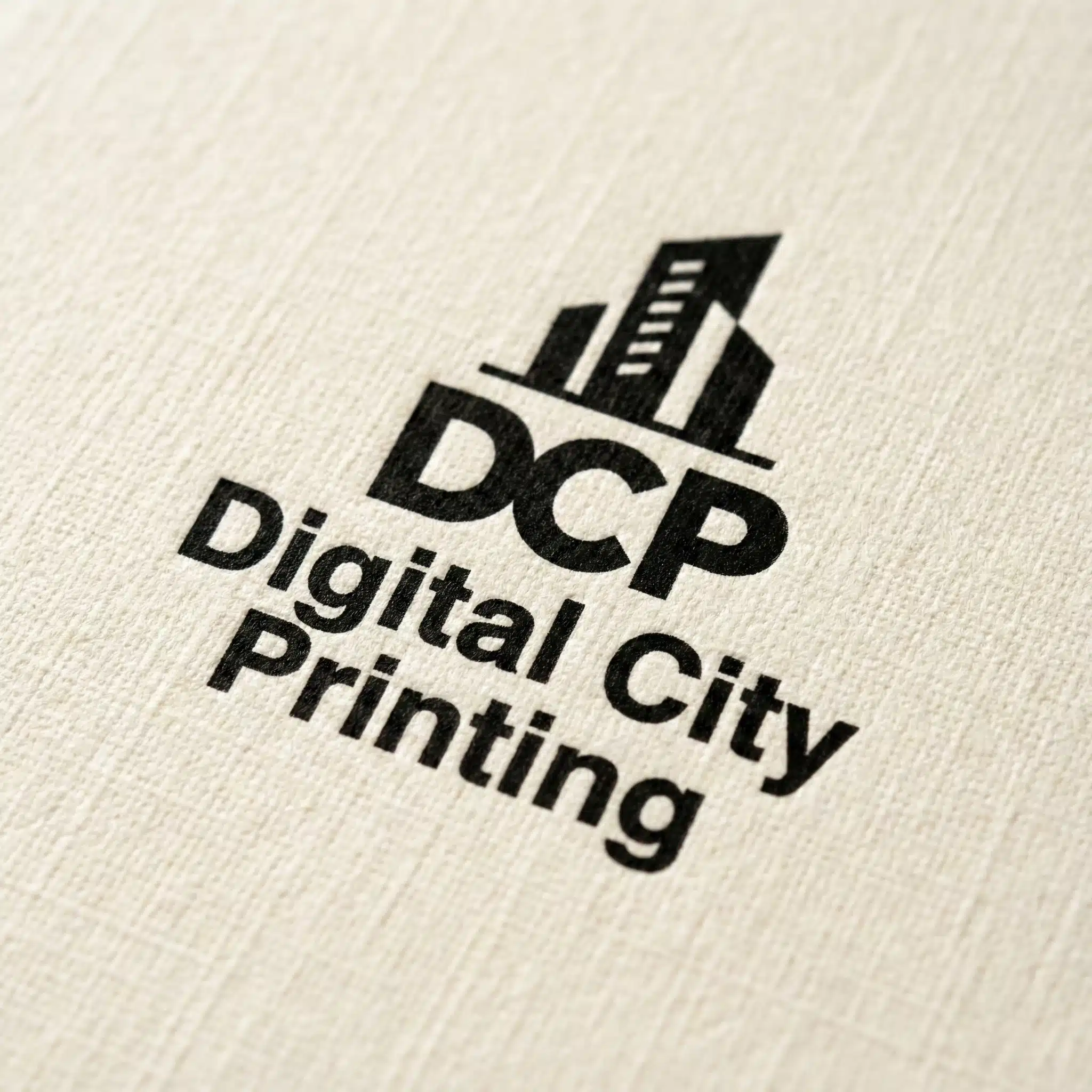 Custom Linen Letterhead Printing NYC Close up of linen texture paper with custom logo printing