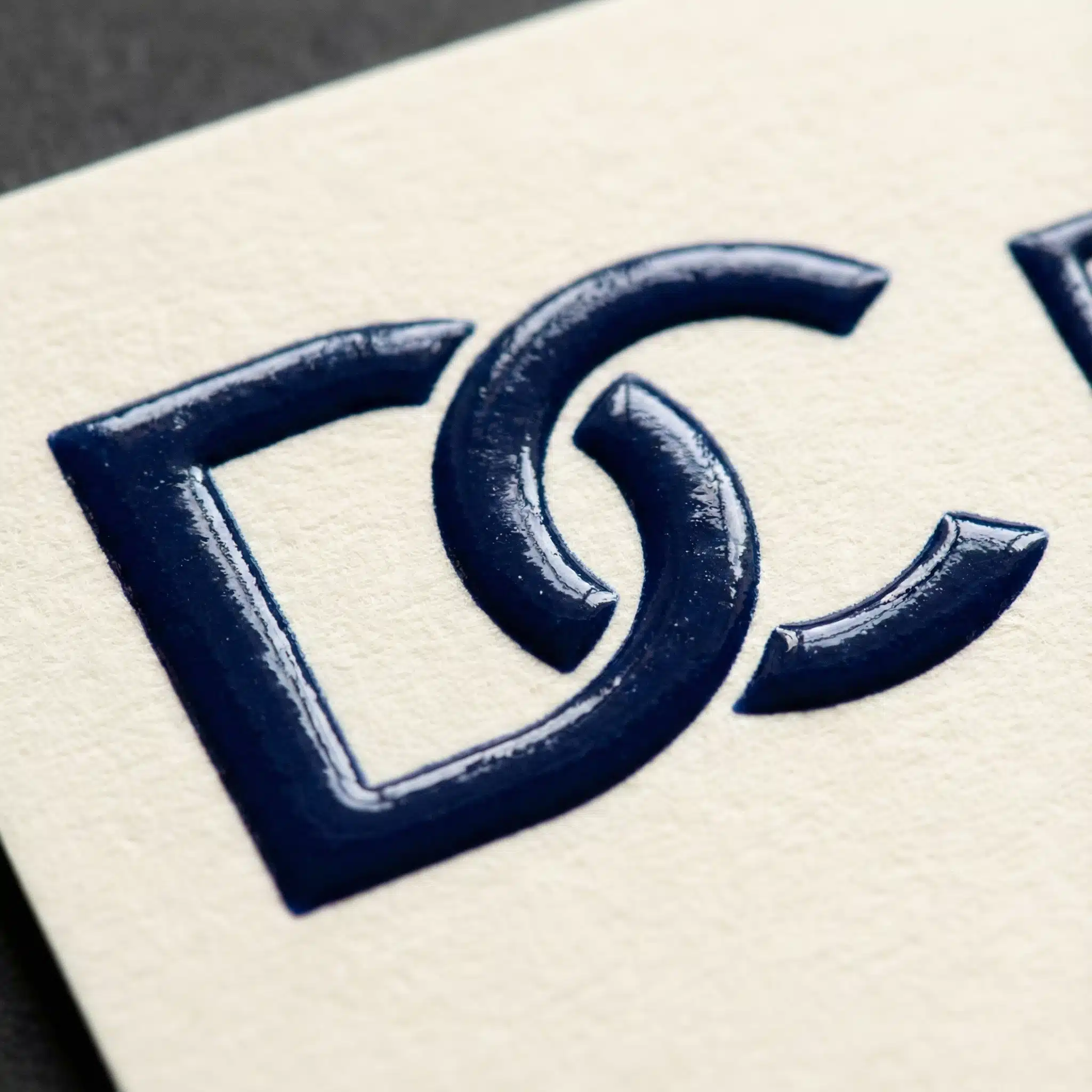 Raised Ink Thermography Stationery Macro shot of raised ink thermography on stationery