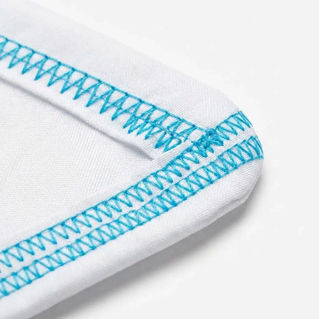 Reinforced Hem Stitching Macro shot of double-stitched reinforced hem on the tip of a polyester feather flag.