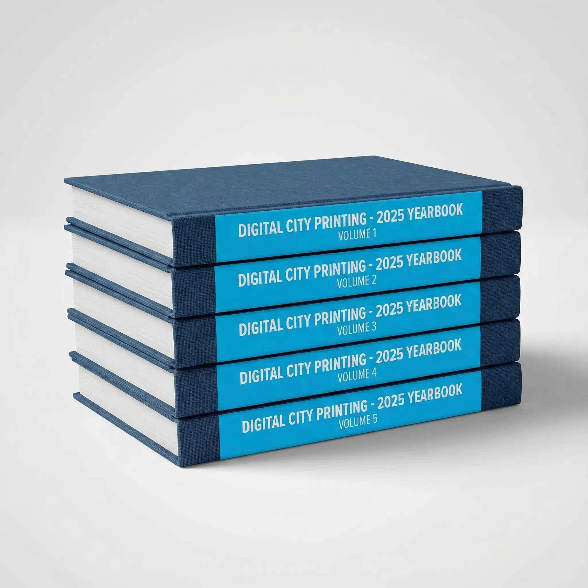 Stack of Custom Yearbooks NYC Neat stack of five custom yearbooks with professionally printed spines featuring cyan branding.