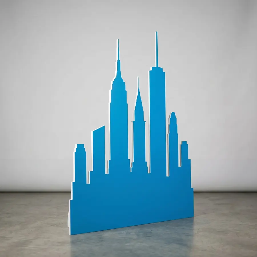 Custom CNC Die-Cut Mounted Signs NYC A large, freestanding, precision-cut foam board NYC skyline painted solid teal blue.