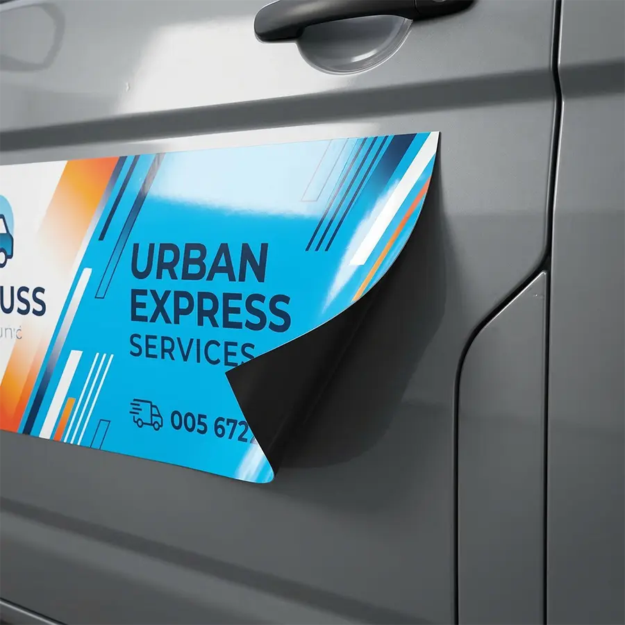 Interchangeable Magnetic Signs for Vehicle Branding A black magnetic sign with blue/orange graphics being lifted to show adhesion to a steel door.