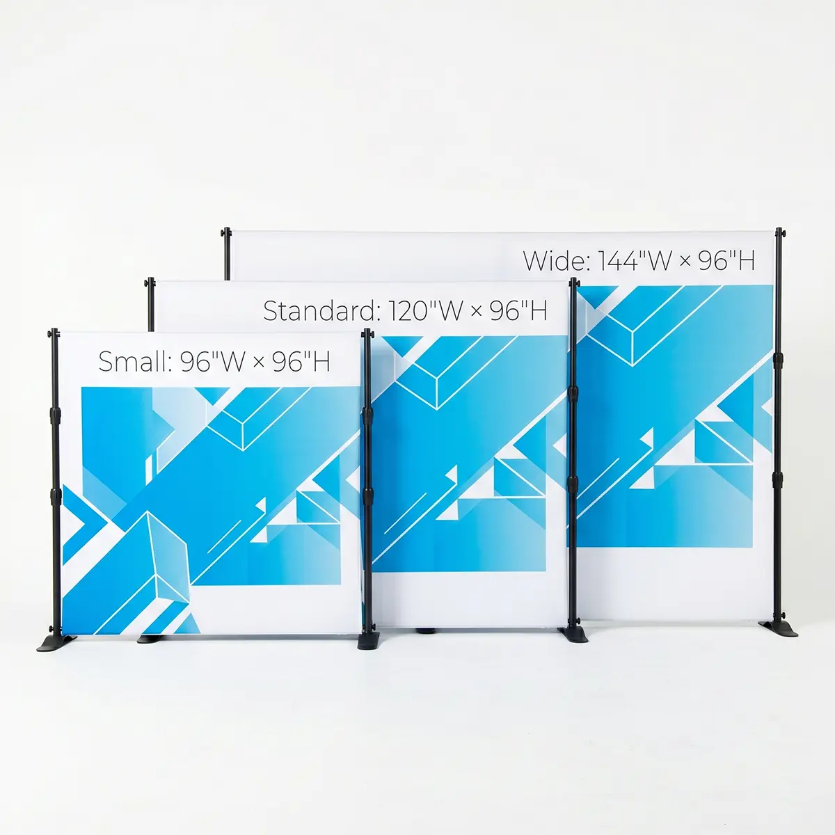 Versatile Fabric Banner Displays with Model A woman in a blue suit stands next to three stacked adjustable fabric banner displays in 'Small' (96"x96"), 'Standard' (120"x96"), and 'Wide' (144"x96") sizes, featuring complex printed designs for 'Vote for Future', 'Azure Sky Realty', and 'Escape to Paradise' against a plain white studio background.