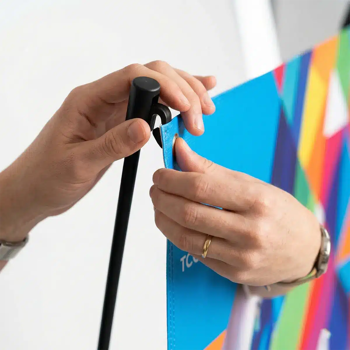 Tool-Free X Banner Stand Assembly Easy tool-free assembly of a custom pop-up X banner display.