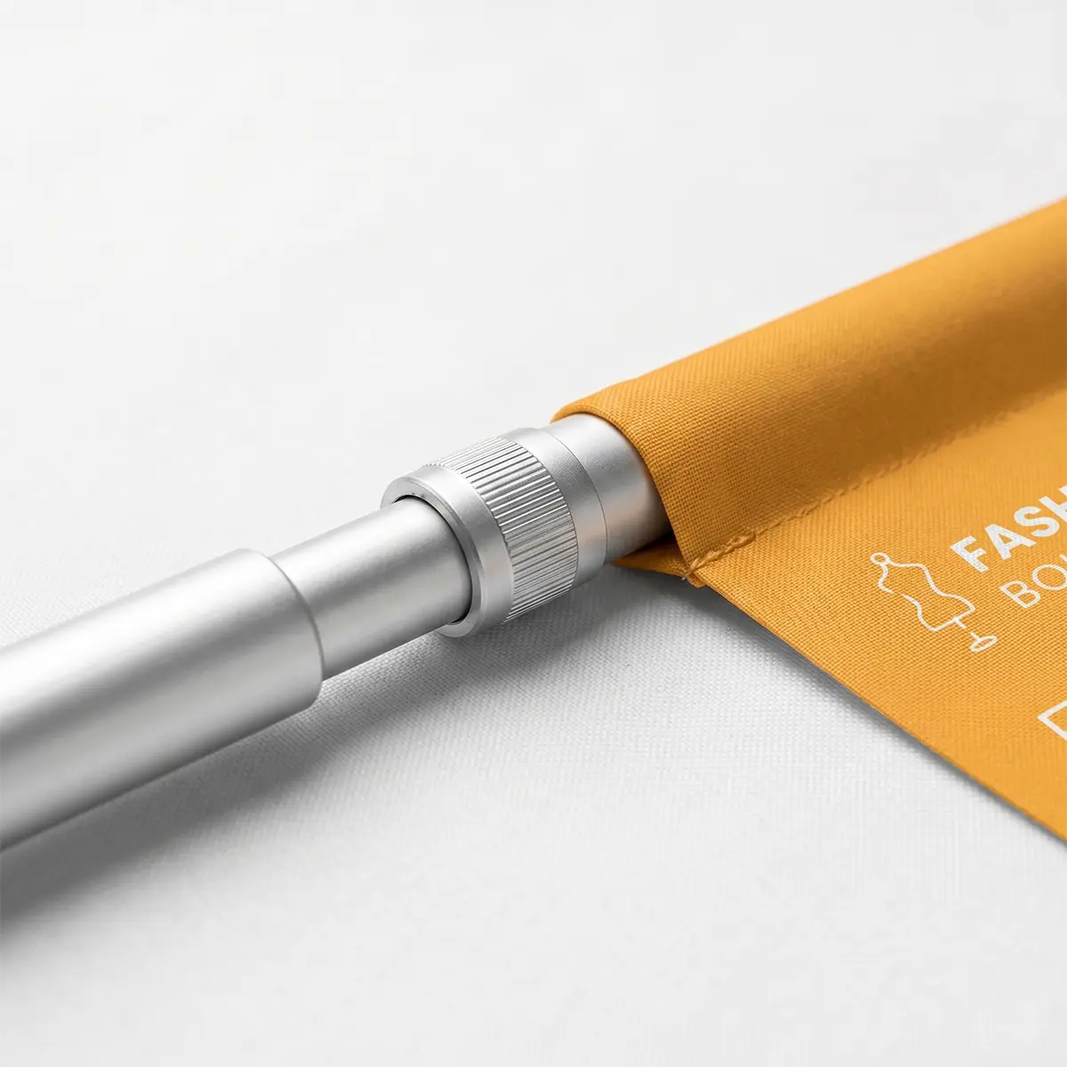 Adjustable Telescopic Banner Stand Hardware — Detail Shot Close-up of telescopic aluminum banner pole with twist-lock height adjustment mechanism