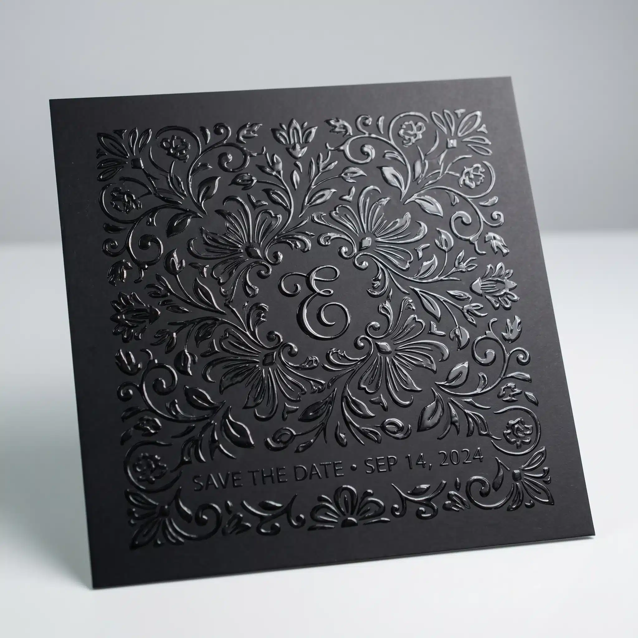 Scodix clear invitations NYC, black ornate save the date wedding card, Sep 14 2024 Black ornate wedding invitation design with raised floral scrollwork and the text “SAVE THE DATE · SEP 14, 2024”.
