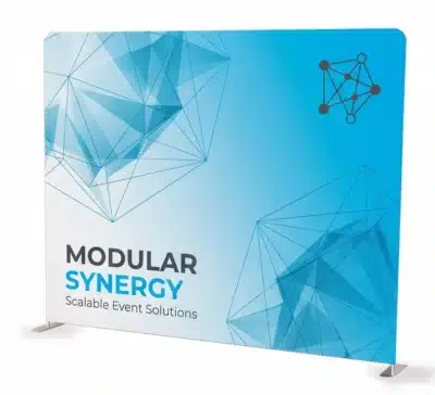 Freestanding Modular Synergy event backdrop with blue geometric graphics and the text “Scalable Event Solutions”