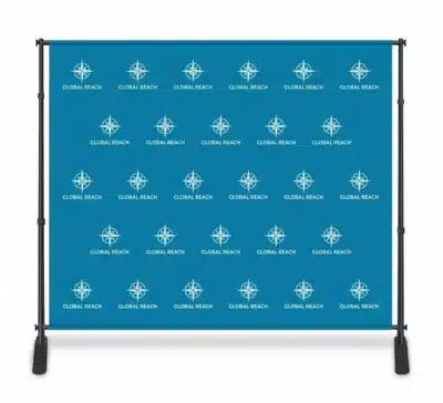 Adjustable telescopic stand supports a blue Global Reach media wall with repeated white logos and dual weighted base plates